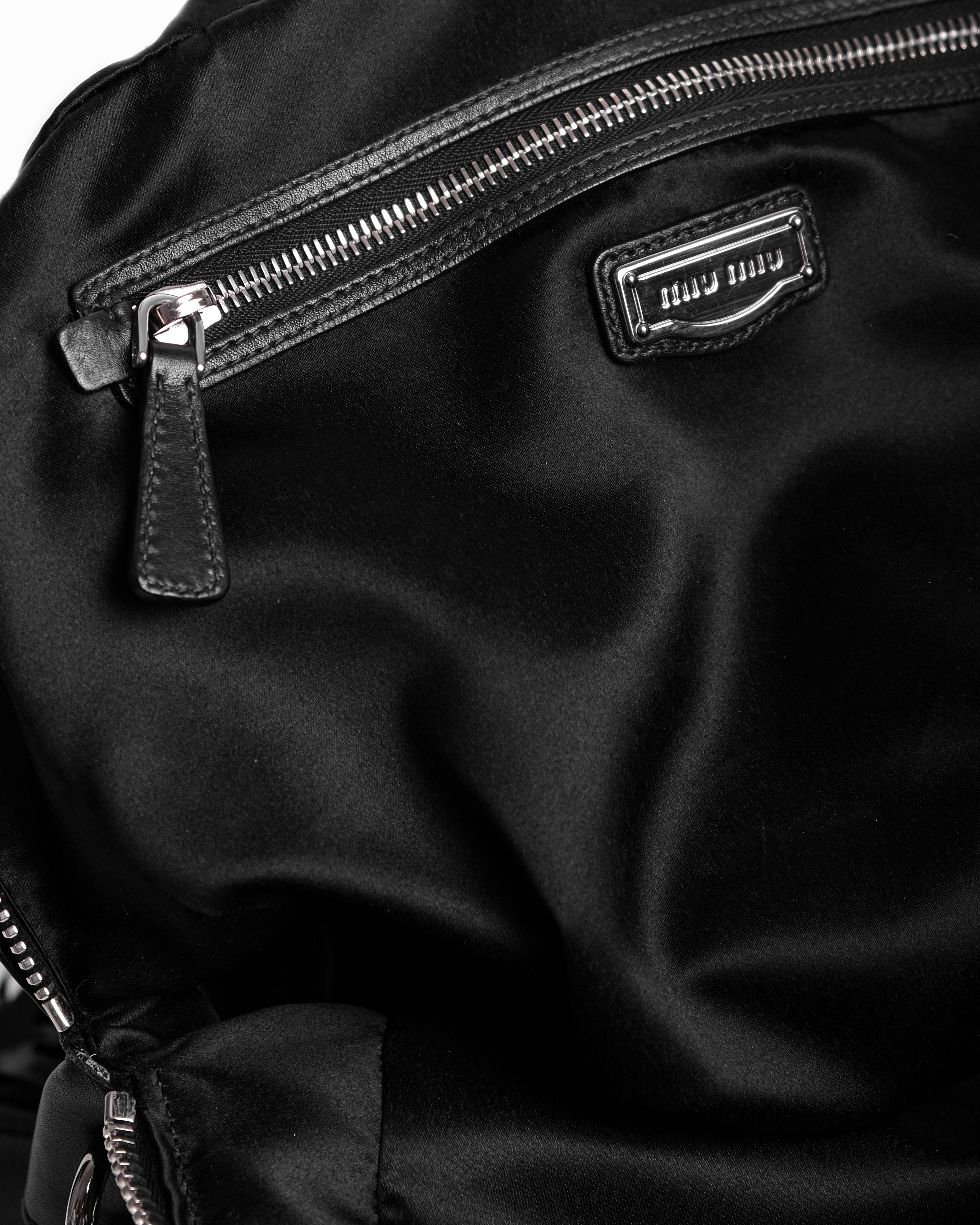 MIU MIU CUTOUT BOWLER HANDBAG