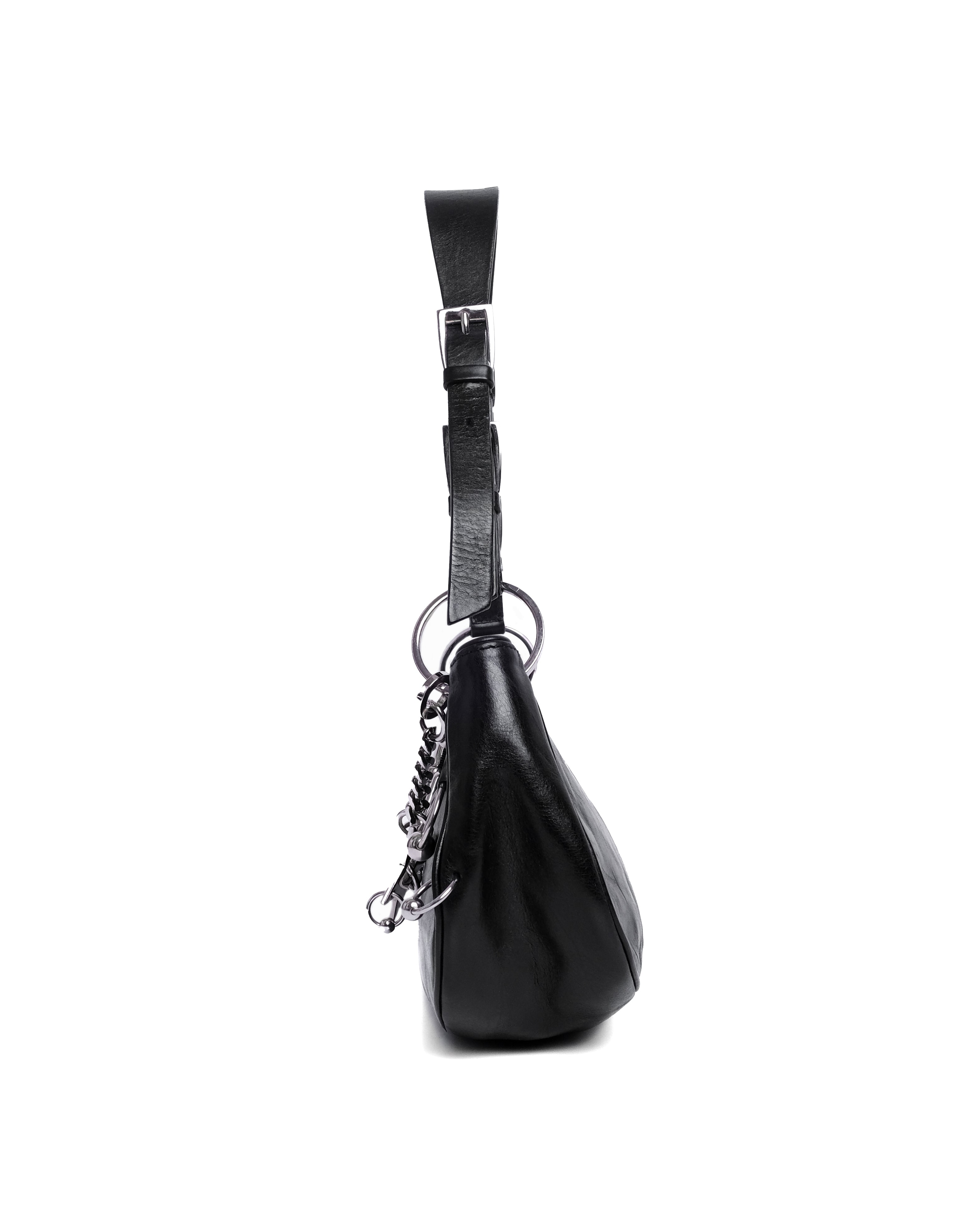 CHRISTIAN DIOR PIERCED HARDCORE BAG – Carrie On